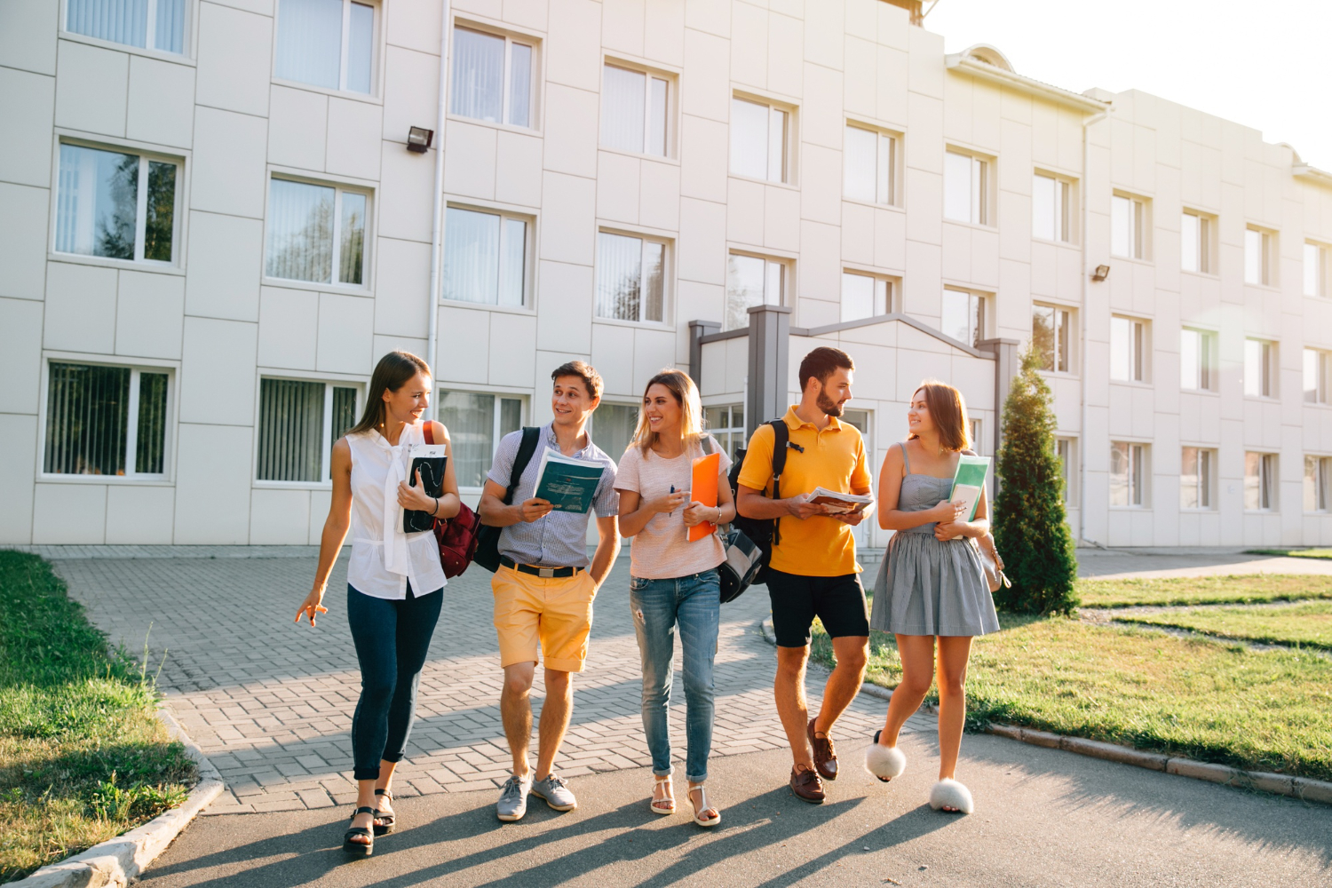 free-time-students-bachelor-s-campus-life-rhythm-five-friendly-students-are-walking (1)